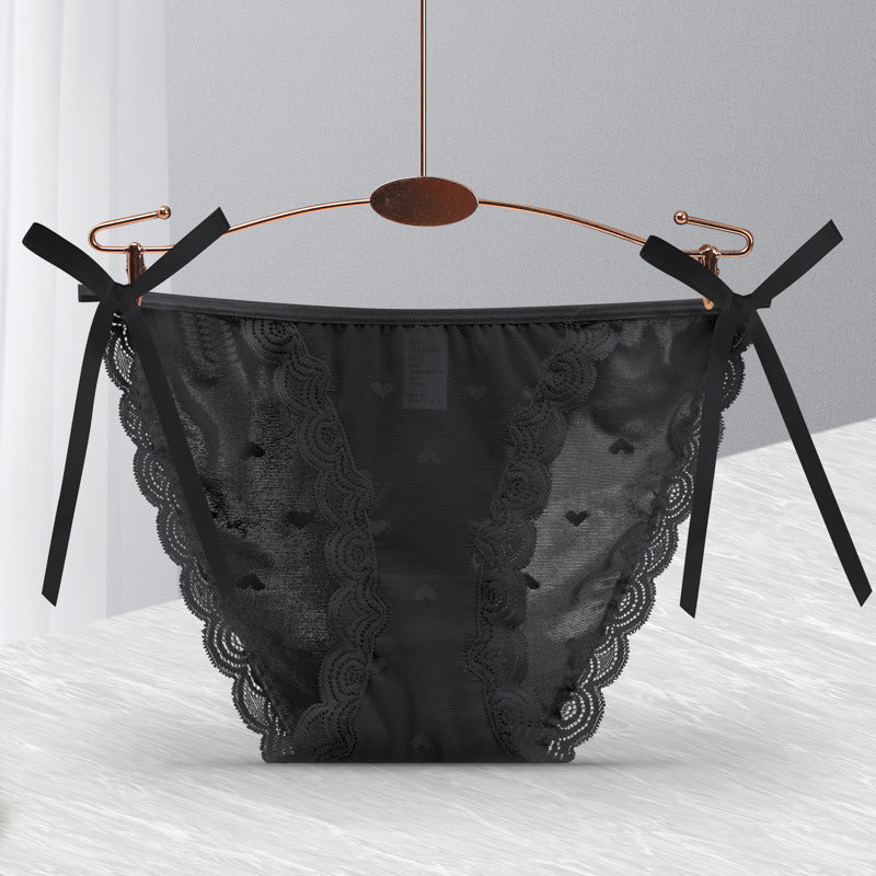 Loose Ends tie-side panties in Black, flat lay