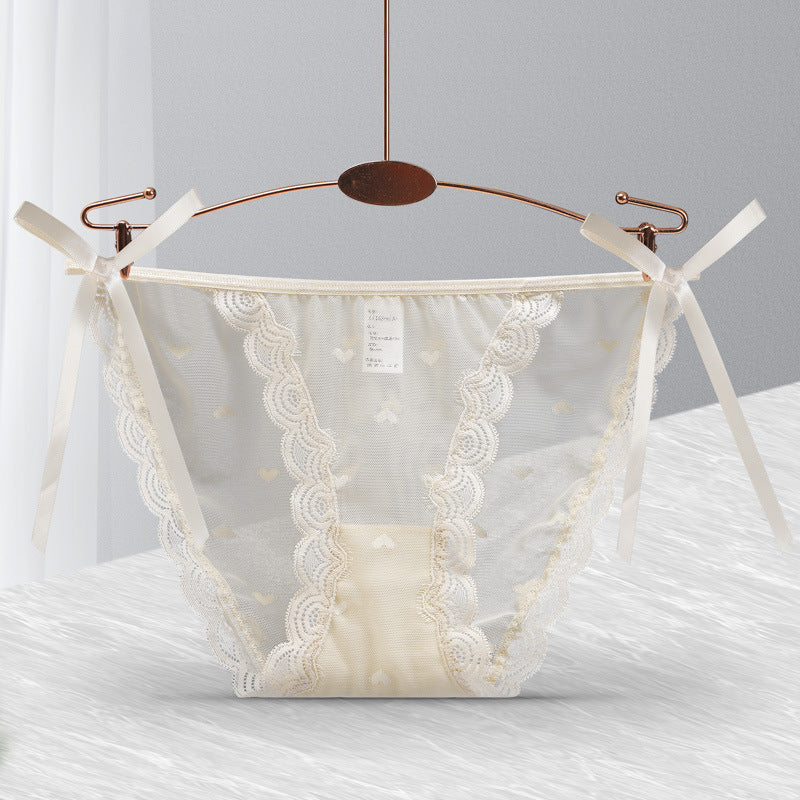 Loose Ends tie-side panties in Cream, flat lay