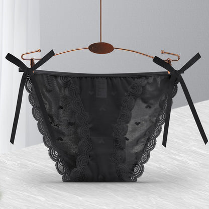 Loose Ends tie-side panties in Black, flat lay