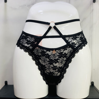 Last Call lace thong in Black, front view on model